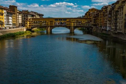 A view down the Arno River in Florence to the famous Ponte Vecchio, this bridge Stock Photos