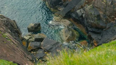 View down the cliffs on Tory Island - Ireland 動画素材 205214583