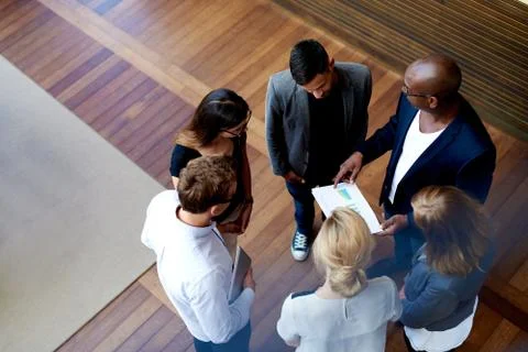 View down of colleagues gathered Stock Photos