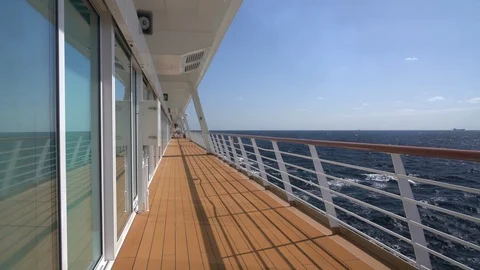 View down the empty walkway on deck of modern cruise ship 動画素材 100769658