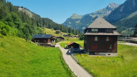 View down the Kander Valley in Kandersteg, Bern, Switzerland, featuring Stock Footage 340944316