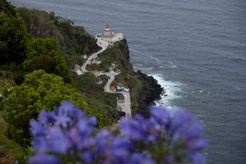 View down to lighthouse on Ponta do Arnel in Nordeste. Sao Miguel Island, Azores Stock Photos