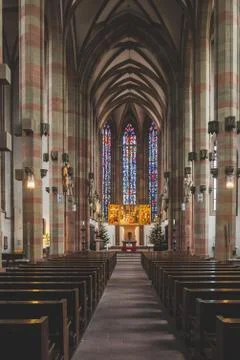 View down the nave towards the high altar inside the Marienkapelle in Wurzbur Stock Photos
