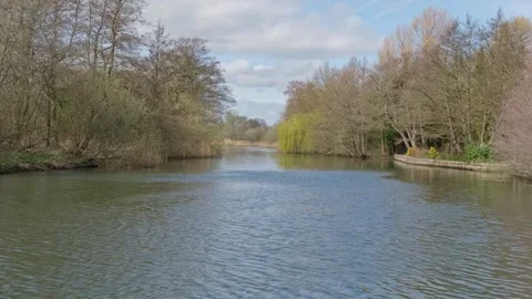 View down the River Bure from Belaugh. Pull back shot 스톡 동영상 332223132
