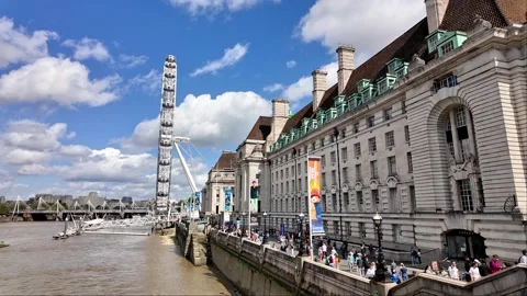 View down the River Thames and South Bank towards the London Eye Stock Footage 283292131