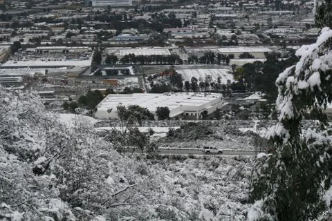 View down snow covered valley Stock Photos