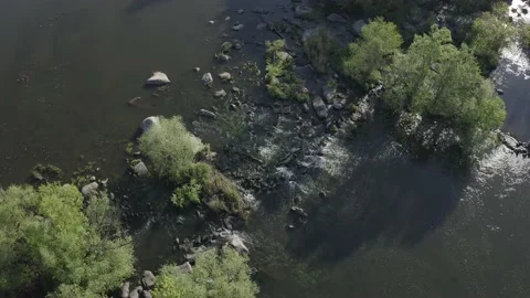 View down for wild river strean against rocky roll. Drone air shot Stock Footage 149073733