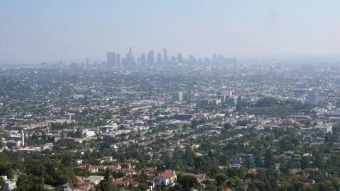 View of downtown LA from Griffith Observatory. Smog in the air. Stock Footage 261587209