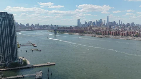 View of downtown NYC flying back into Greenpoint Williamsburg Bkln Stock Footage 342766573