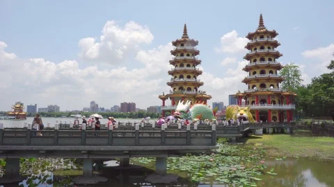 View of the Dragon and Tiger Pagodas at Lotus Lake Stock Footage 108716660