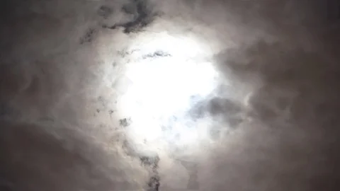 View of dramatic big moon on night blue sky on cloudy day. Glare from the moon. Stock Footage 108015829