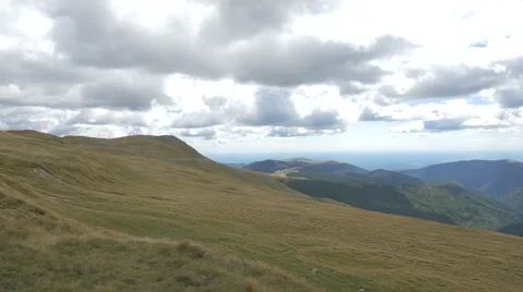 View of dried hills on a cloudy day on Transalpina Stock Footage 57792266