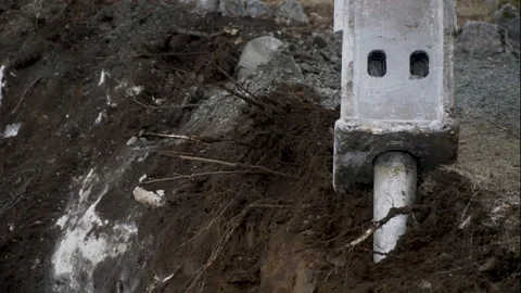 View of the drill crushes soil and stones Video stock 138886196