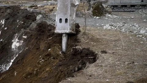 View of the drill crushes soil and stones Stock Footage 138894868