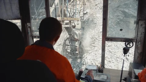 View from the driver’s cab as the bucket picks up iron ore Stock Footage 116774930