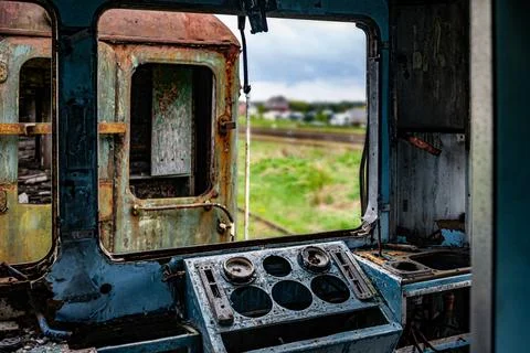 View from the driver's cabin of an old damaged passenger electric train Stock Photos