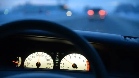 View from the driver's seat on the winter road, instrument panel Stockbeeldmateriaal 44293672