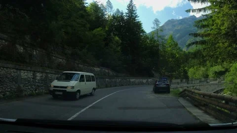 View from the driving car of a beautiful alpine valley in Slovenia, Europe Stock Footage 221442383