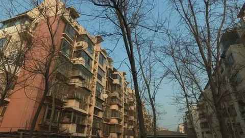 View from the driving car of the residental area of the town Stock Footage