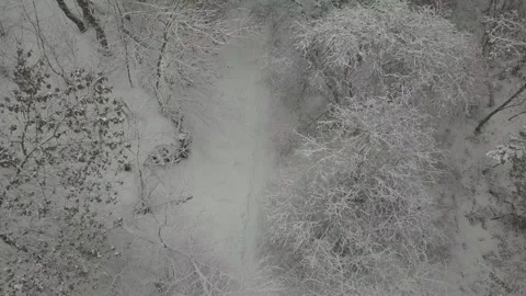 View from a drone to an abandoned, snow-covered vehicle fleet of technical Stock Footage 145211349