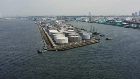 View from drone approaching factory that is built in the middle of the river Stock Footage 126612521