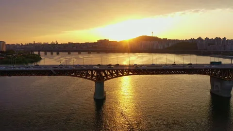 View from drone camera overlooking the Han River landscape and the golden light Vídeos de archivo 225025671