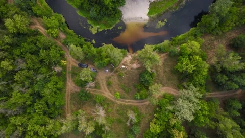 View from a drone, camera takeoff over the forest and the Orel River. Video stock 180974790