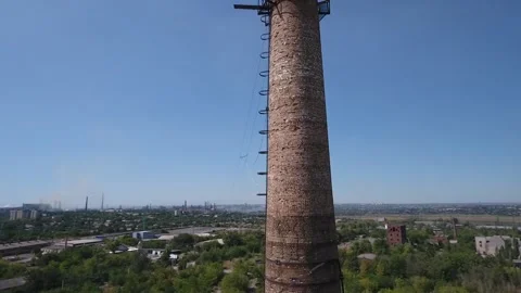 View from the drone. Circling around the old factory chimney. Ruins of factories Stock Footage 161980080