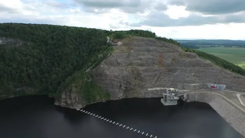 View from the drone cliffs on the shore of the pond and gazebos on it Stock Footage 130267997