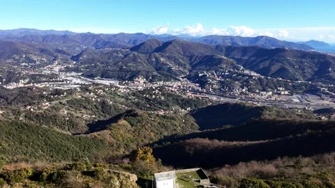 View from a drone flying over the Chapel of Monte Teiolo in Genoa Stock Footage 322508706