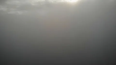 View from a drone flying over a cloud in the morning With the mountainous env Stock Footage 115583660