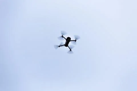 View of a drone flying on white background Stock Photos