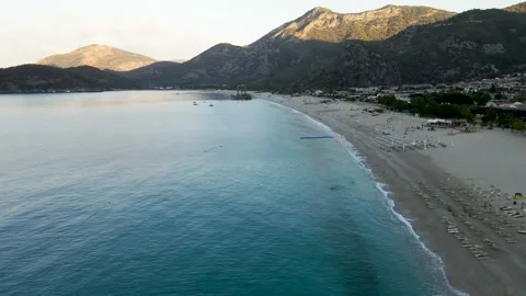 View from the drone from high to the Mediterranean Sea, mountains, people on the Stock Footage 169087253