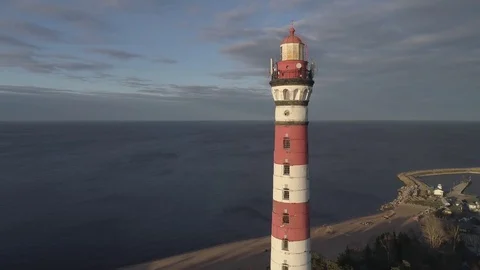 View from drone to the lighthouse it helps ships during bad weather on the water Stock Footage 75465067