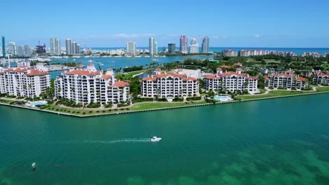 View from drone on Miami Beach and Fisher Island with row of incredible multy Stock Footage 247837569