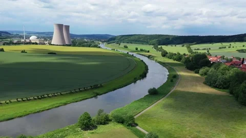 View of drone of nuclear power plant and river Stockbeeldmateriaal 197764168