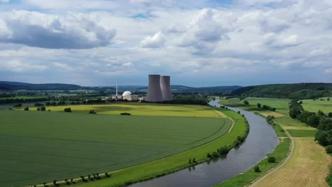 View of drone of nuclear power plant and river Stockbeeldmateriaal 197764529