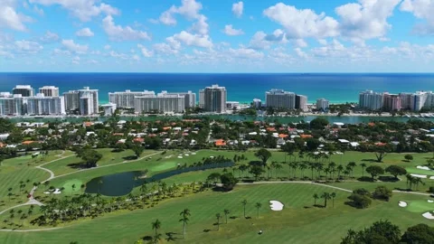 View from drone on popular La Gorce Club in Miami with green lawns, palm trees Stock Footage 255800129