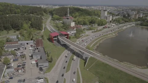 The view from the drone on the railway bridge and the ecological train Stock Footage 165269488