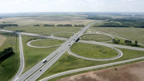 View from the drone road traffic outside the city Stock Footage 113296662