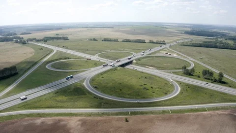 View from the drone road traffic outside the city Stock Footage 113318371