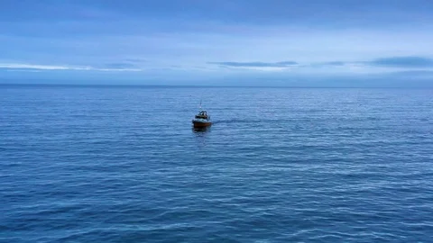 View from the drone at sea with a ship at night Stock Footage 122699308