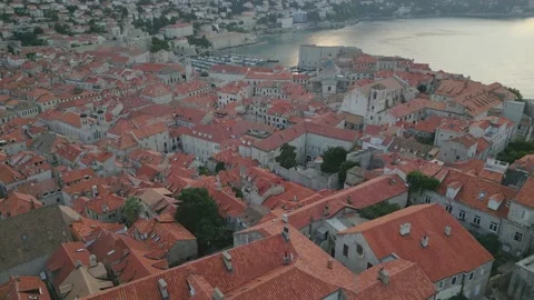 View from drone on the streets and buildings with red roofs of the old town of Stock Footage 224089145