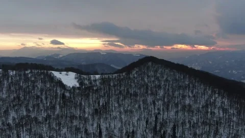 View from the drone at sunset in the winter mountains. Carpathians. Ukraine. Stock Footage 169224094