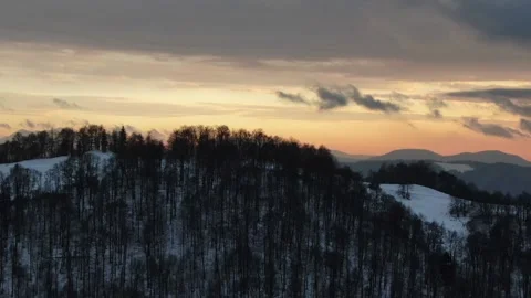 View from the drone at sunset in the winter mountains. Carpathians. Ukraine. Stock Footage 169396845