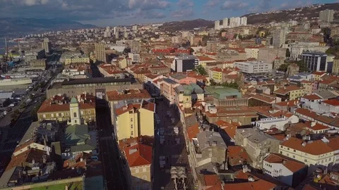 View from the drone on the tiled roofs of the old town Rijeka in Croatia. Stock Footage 101327648