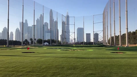 View on the Dubai skyline from the golf course 스톡 동영상 147982589