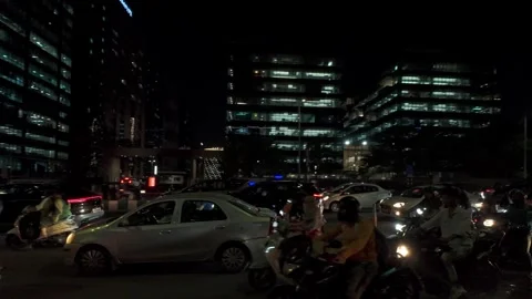 View of Durgam Cheruvu Road with evening vehicle traffic Stock Footage 314131629
