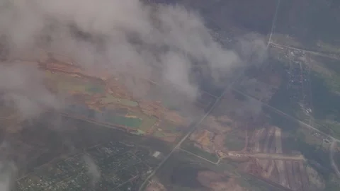 View of the earth from an airplane window Stock Footage 253112876