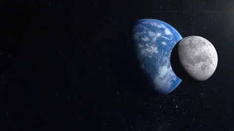 View of Earth and moon from space. They are almost completely illuminated by the Stock Footage 119539170